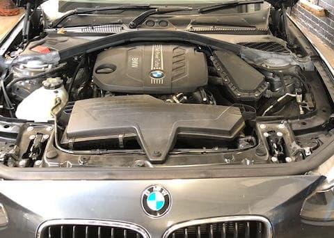 Our garage and workshop are equipped to diagnose and repair all makes and models of cars and commercial vehicles Becra Auto Care diagnosing a customers engine